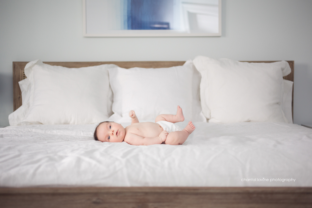 newborn-boy-on-bed