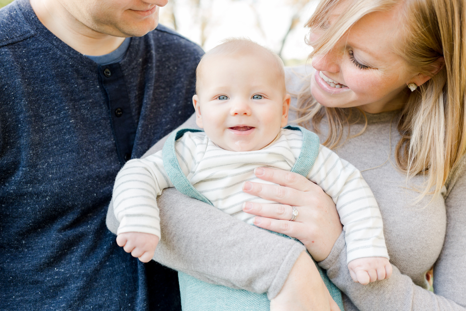 four-month-old-boy-with-parents-closeup